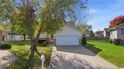 Mature trees, a large storage shed, new outdoor fixtures and a cement driveway compliment this move-in ready home!
