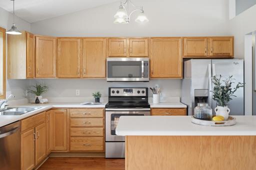 Abundant hardwood cabinets provide plenty of storage!
