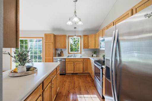 Kitchen with hardwood cabinets, stainless steel appliances and a reverse osmosis water filtration system