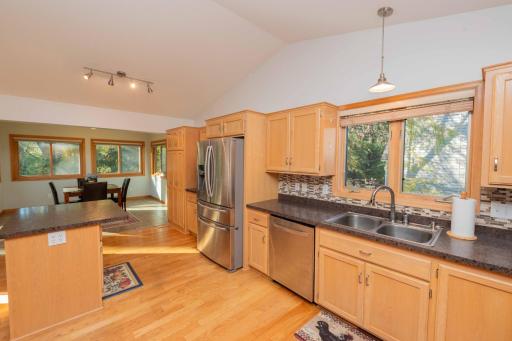 Hardwood flooring flows through the kitchen.