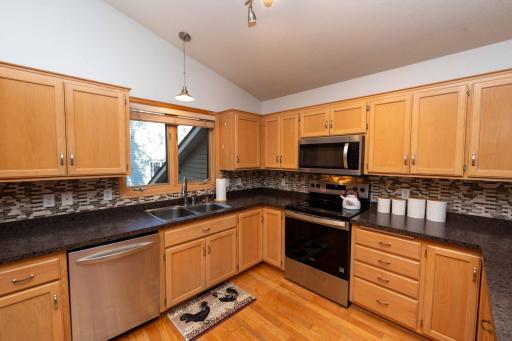 A window above the sink brings in natural light. The microwave was replaced in spring 2026.