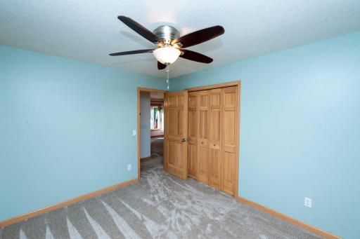 Bifold closet doors keep storage neatly tucked away.