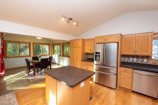 An open connection to the dining room keeps everyone together.