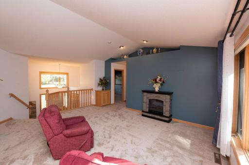 Vaulted ceilings add height to this comfortable gathering space.