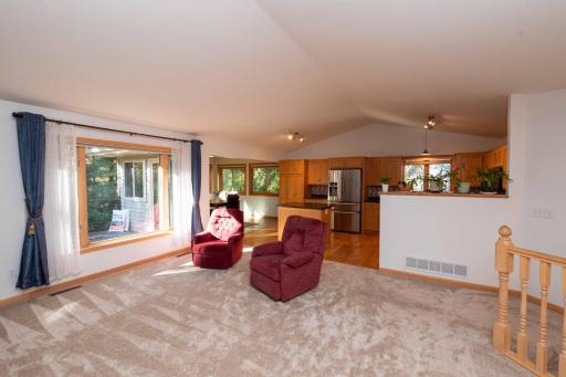 The living room opens to the kitchen and dining spaces.
