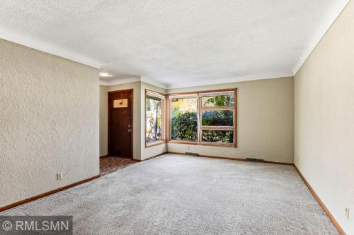 Spacious and sunny living room welcoming you home each day!