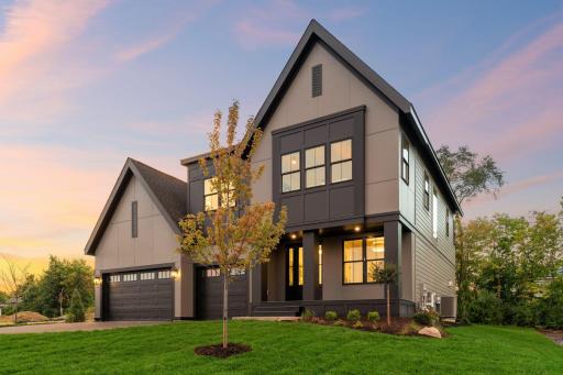 Modern Farmhouse Facade with Black Window Accents