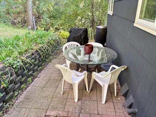 Backyard patio with beautiful lillies in the summer