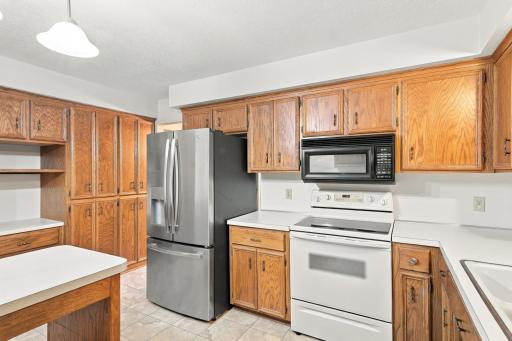 Stainless steel refrigerator and extra cabinets