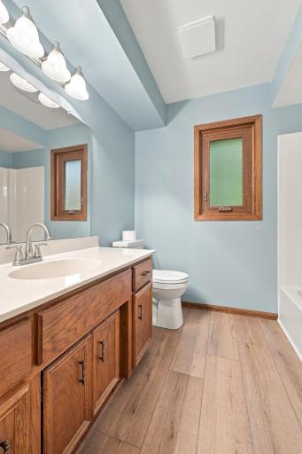Upper level full bathroom with new floors in 2026