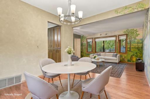 Virtually staged dining room and family room