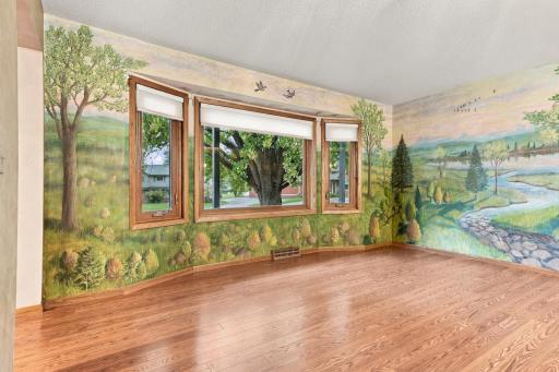 Family room with large window overlooking the front yard
