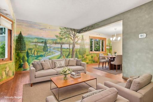 Virtually staged family room and dining room with custom wall mural