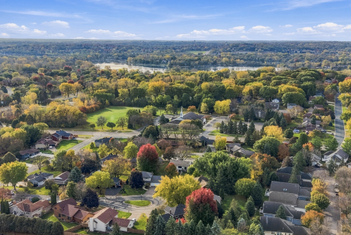 Aerial view of the neighborhood with a view of Crystal Lake nearby