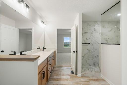 Owner's Bathroom with Fully Tiled Walk-In Shower