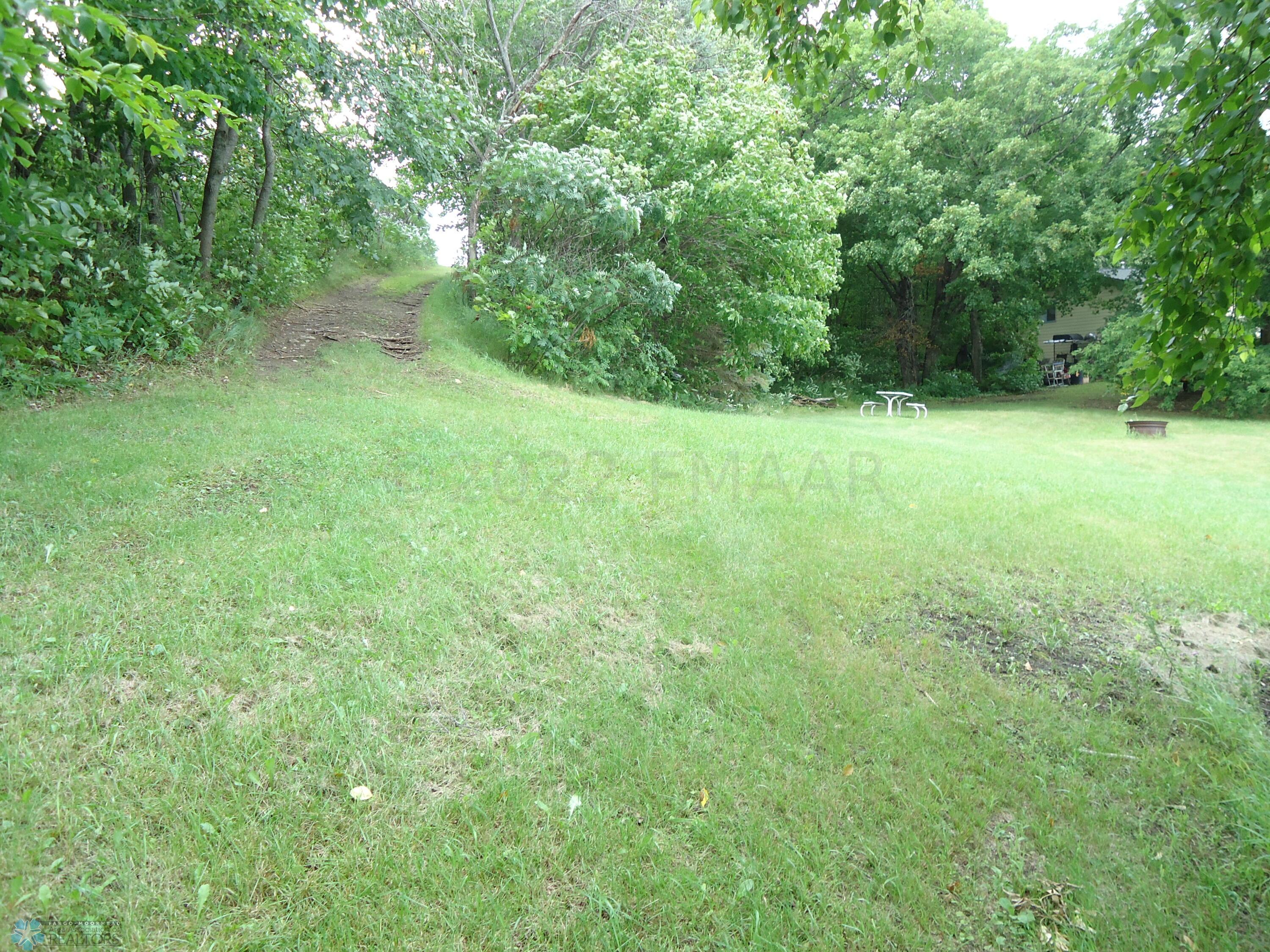 Hill in middle of lake lot