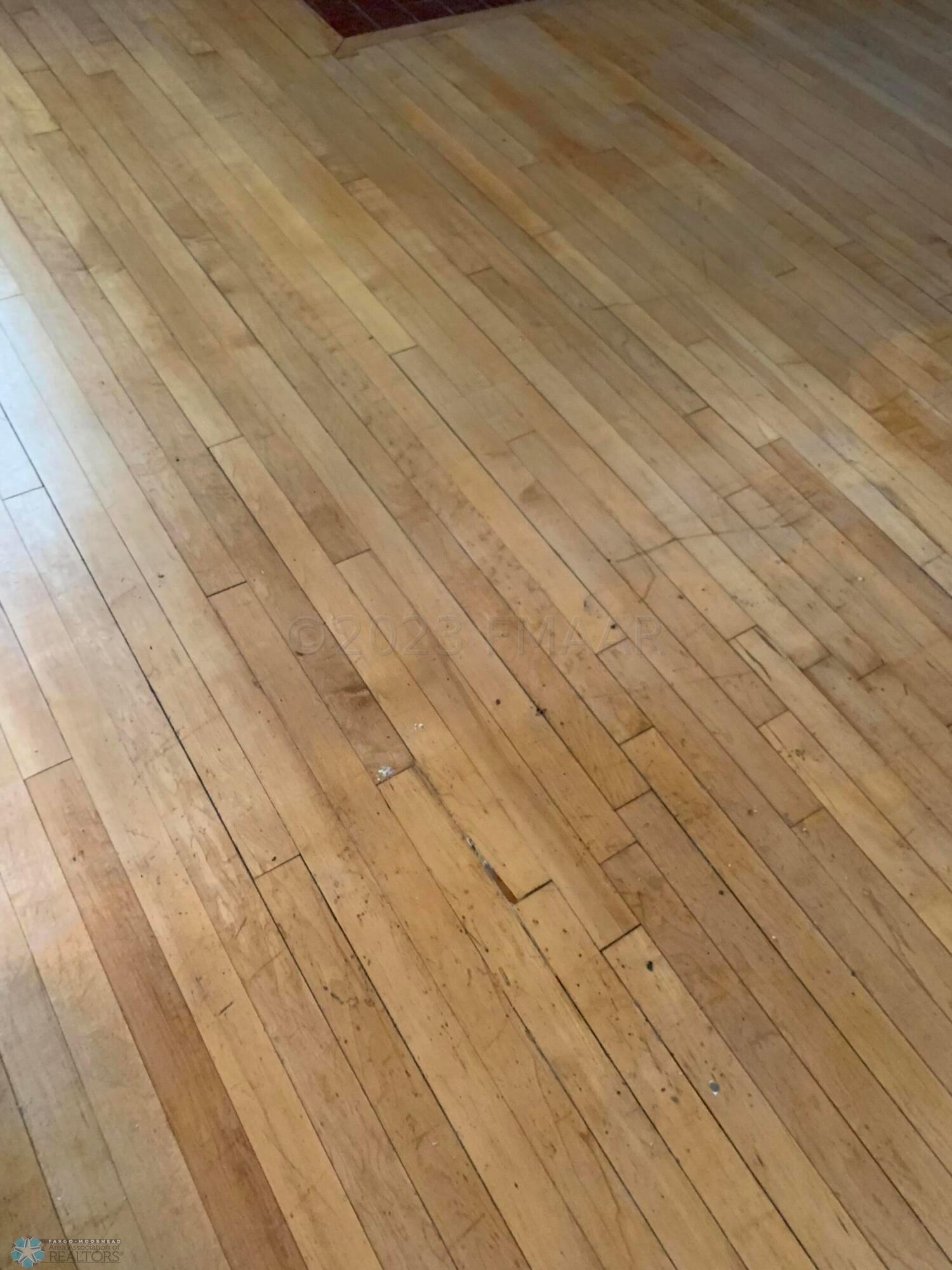 REFINISHED MAPLE FLOORS