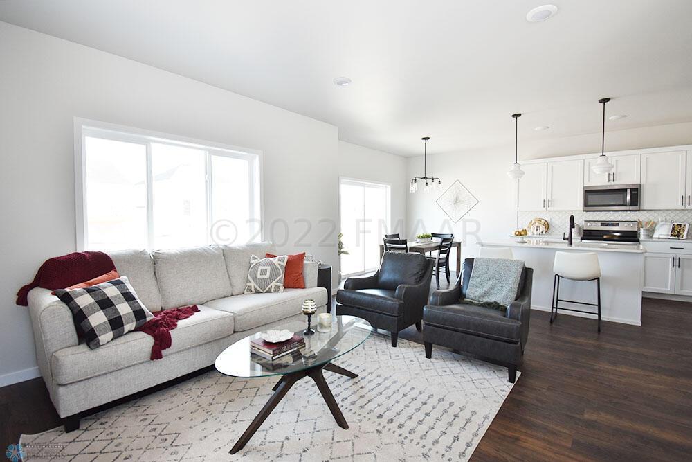 Photos are of a previous model.