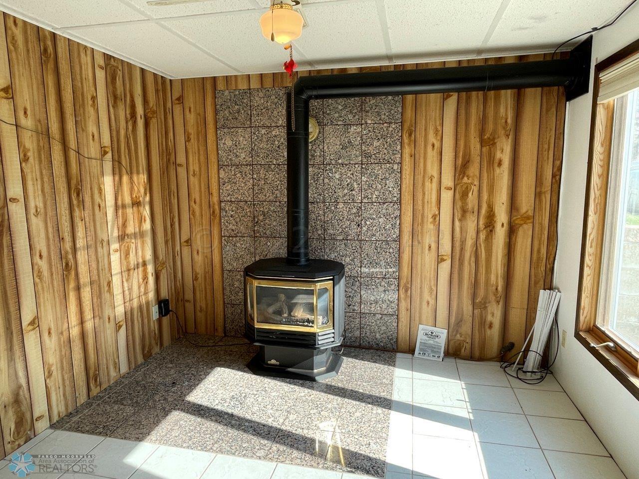 10-Gas free standing fireplace in family