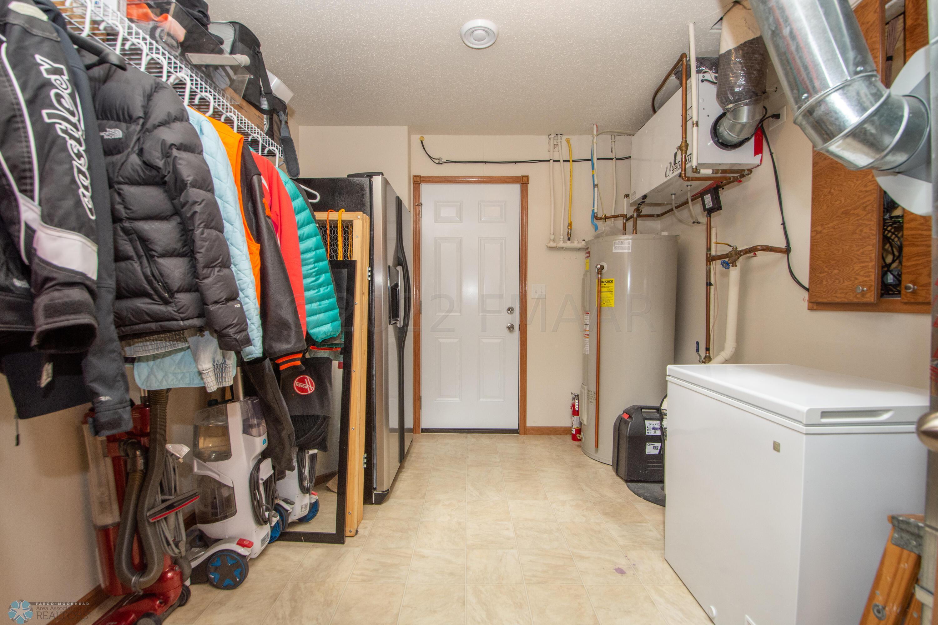 Utility Room with Walk Up to Garage