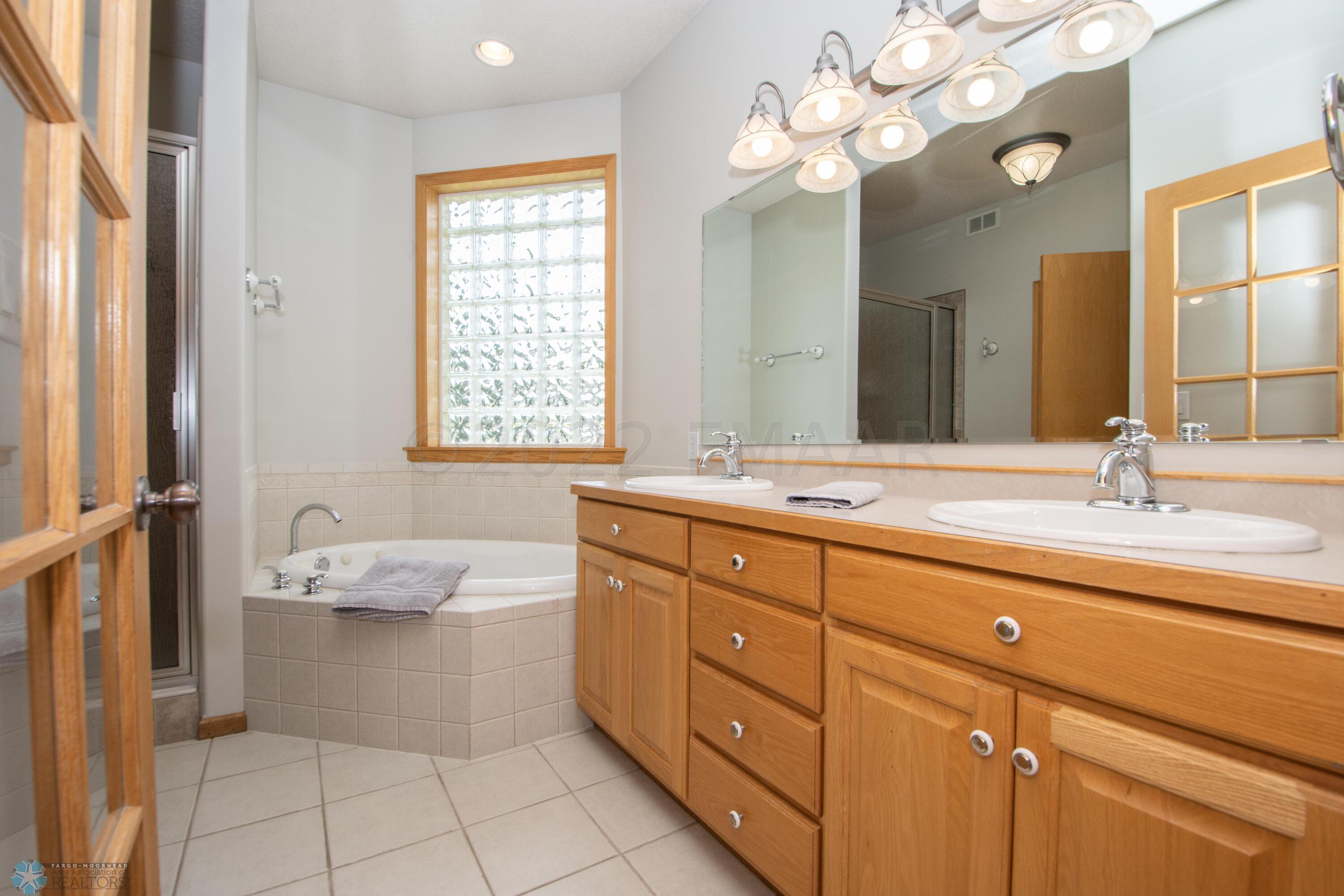 On suite-double vanity/tub/tile shower