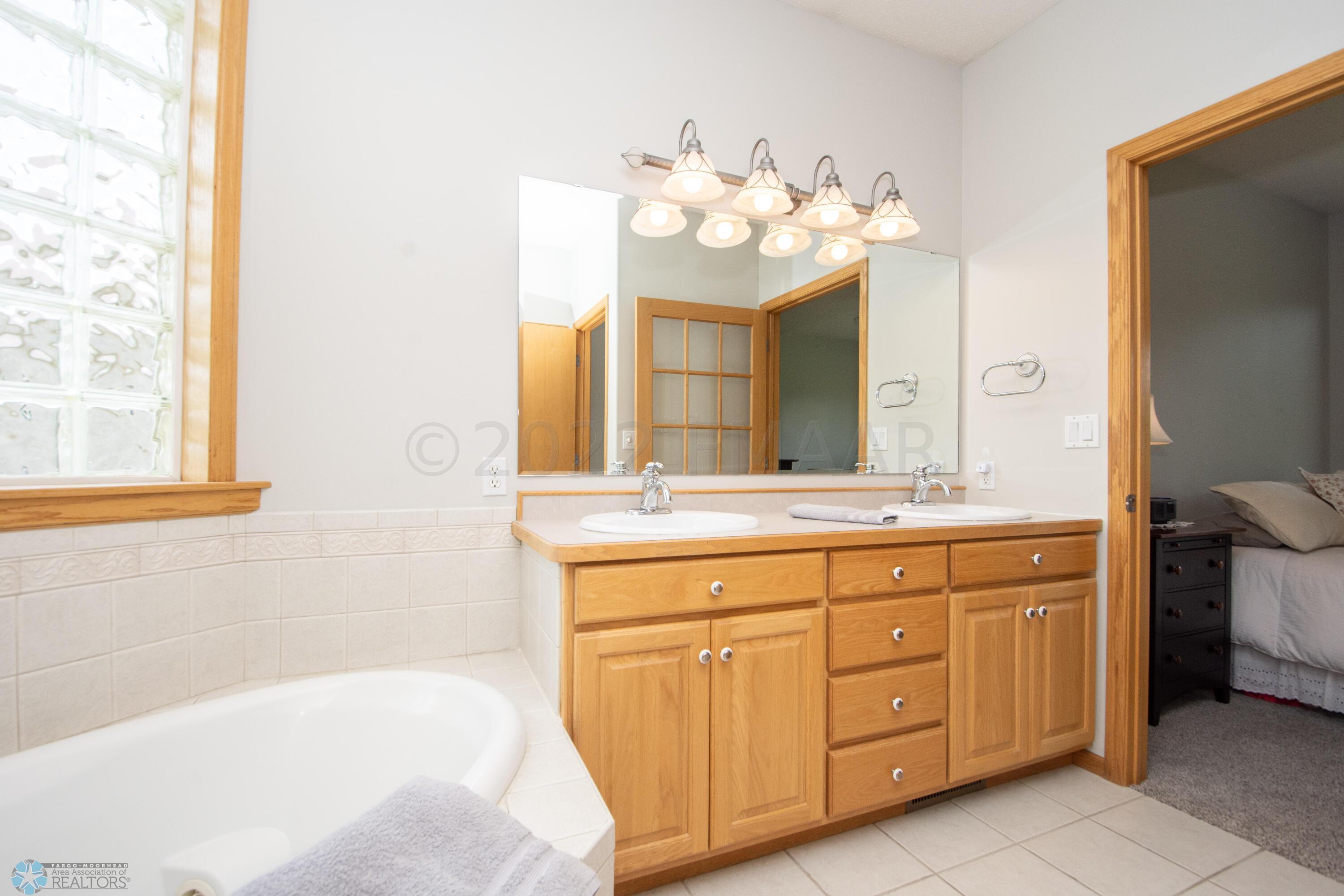 On suite-double vanity/tub/tile shower