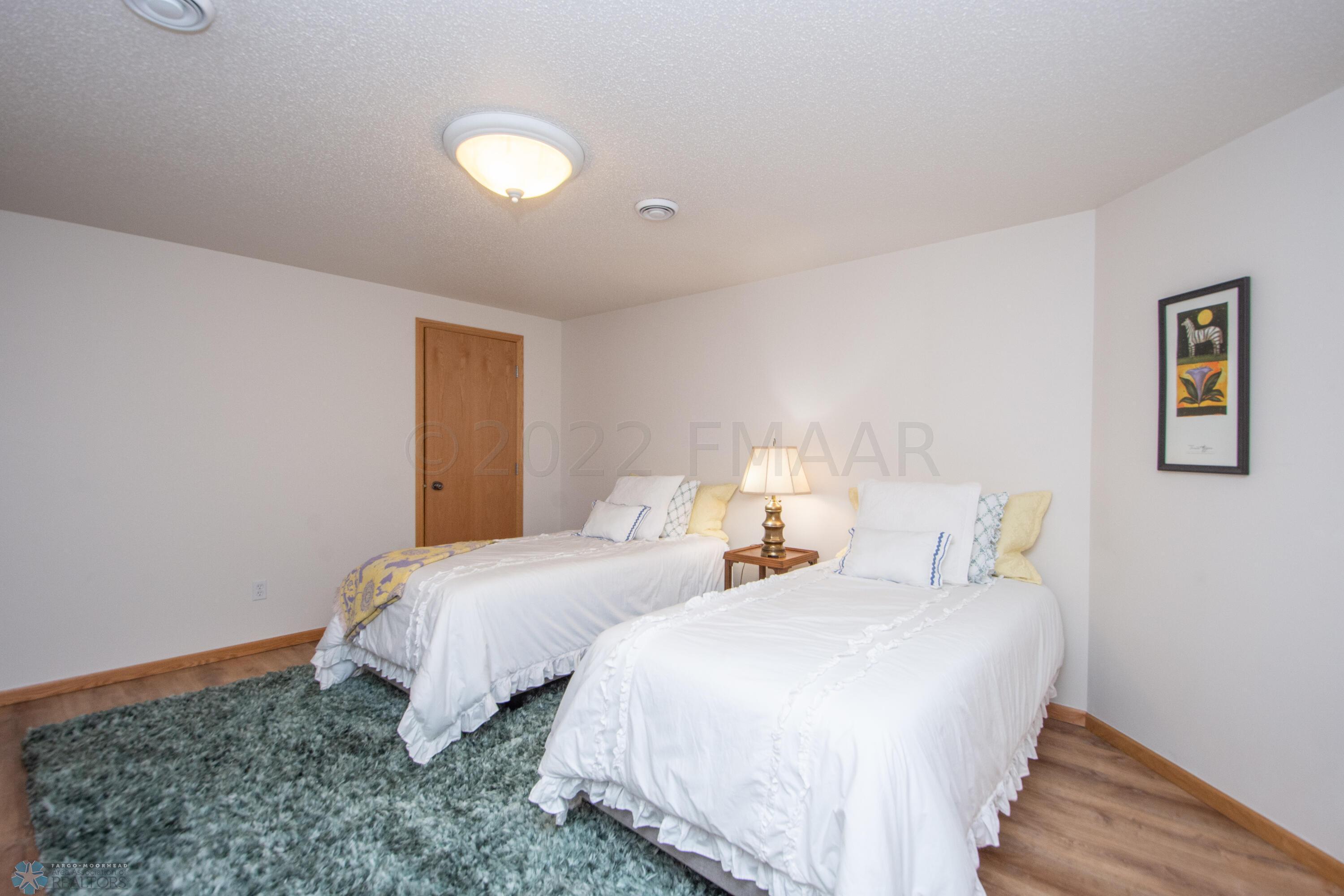 Bedroom with walk in closet