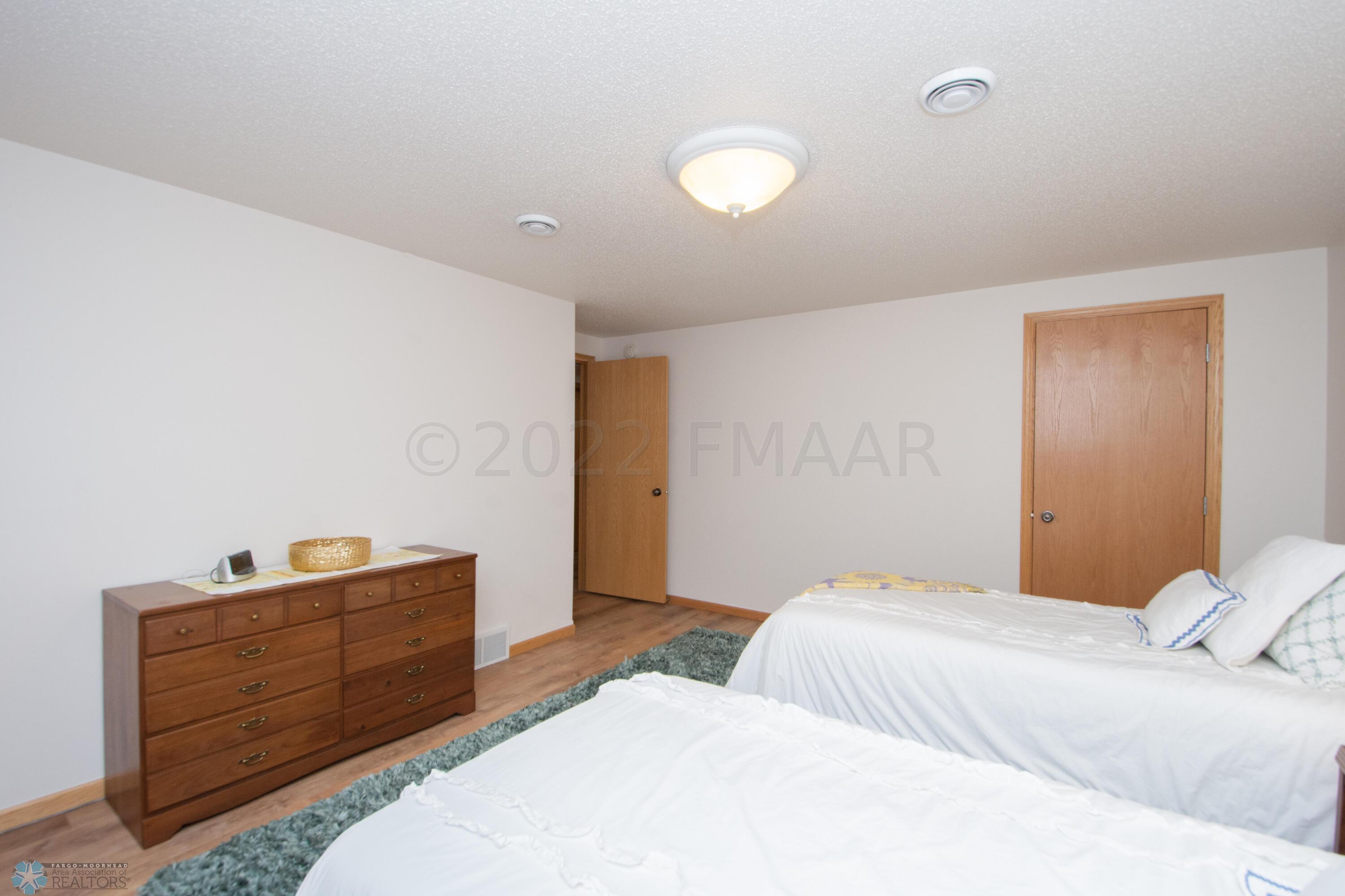 Bedroom with walk in closet