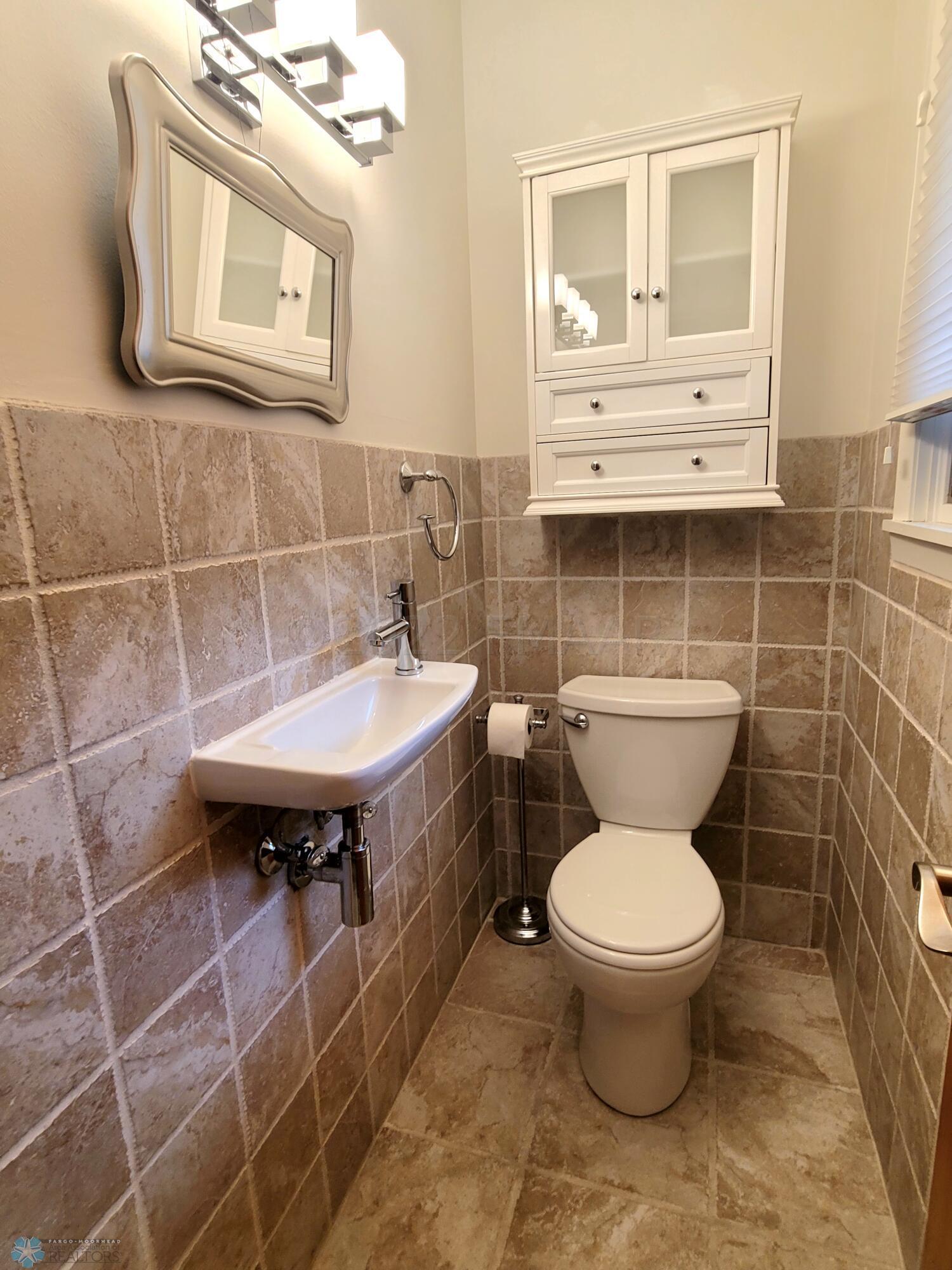1/2 bath off garage