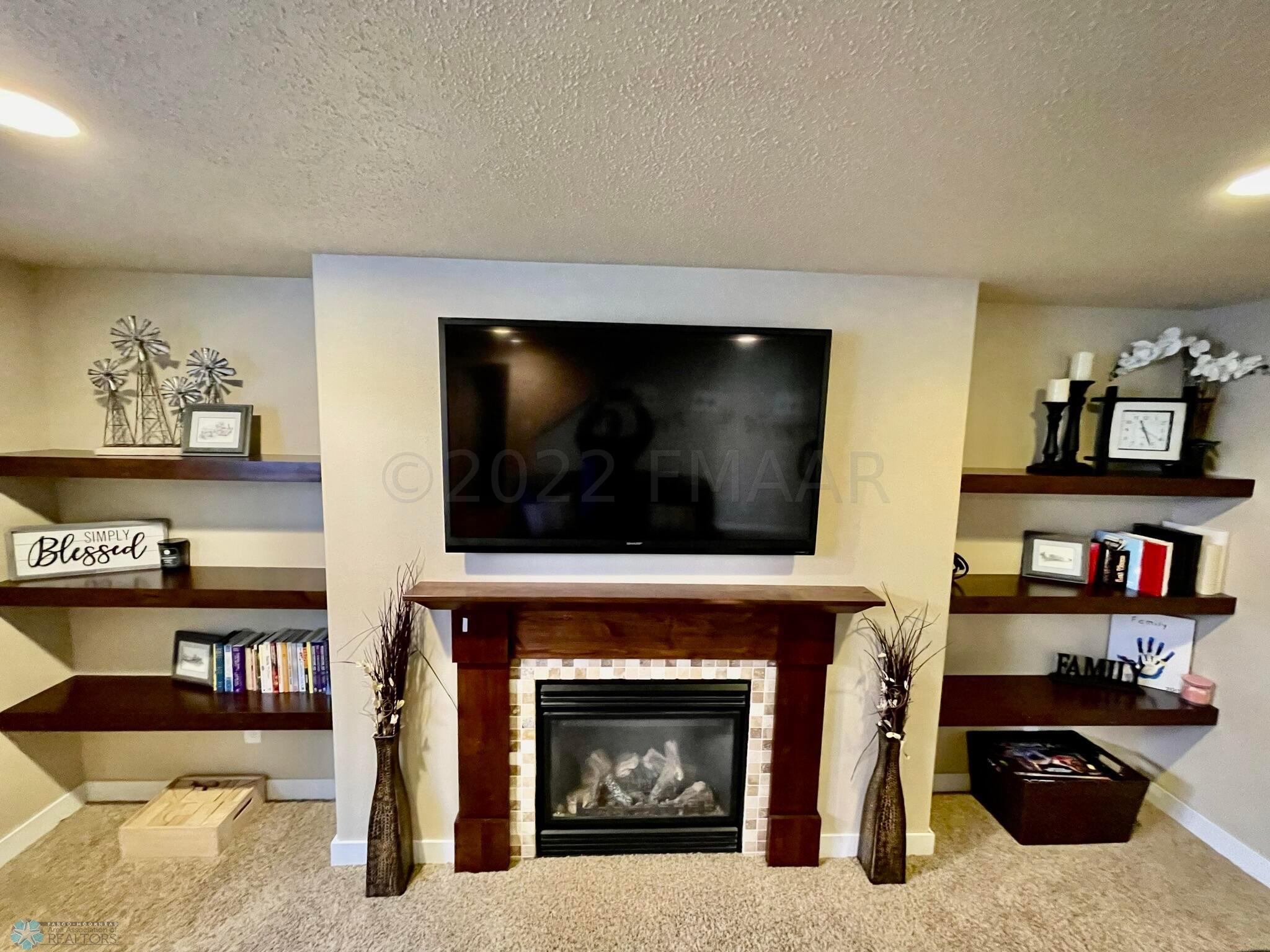 Basement gas fireplace.