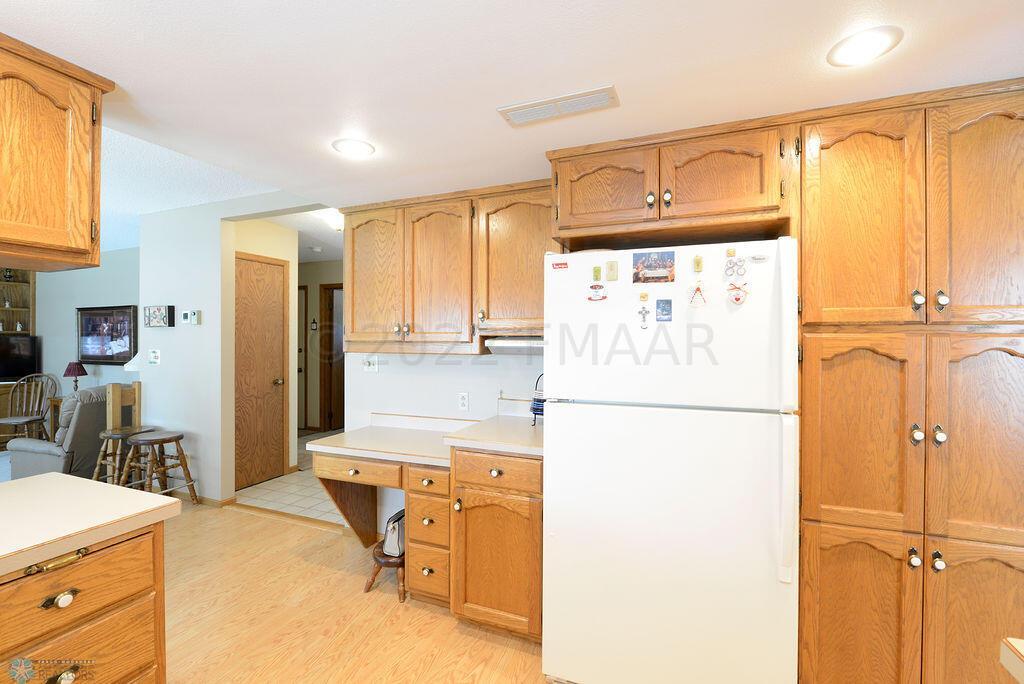 Kitchen View To Foyer