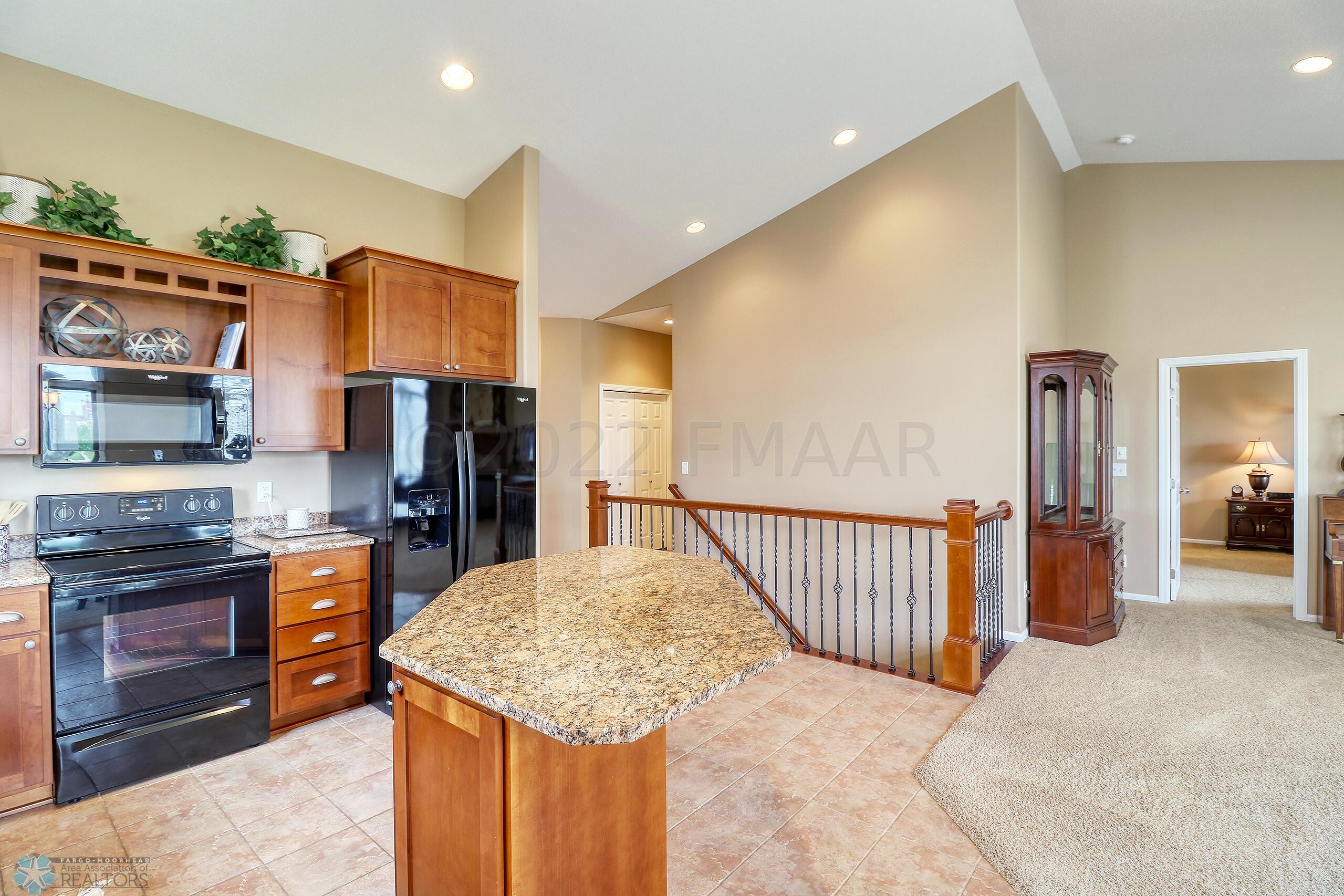 Bright Kitchen with Vaulted Ceilings
