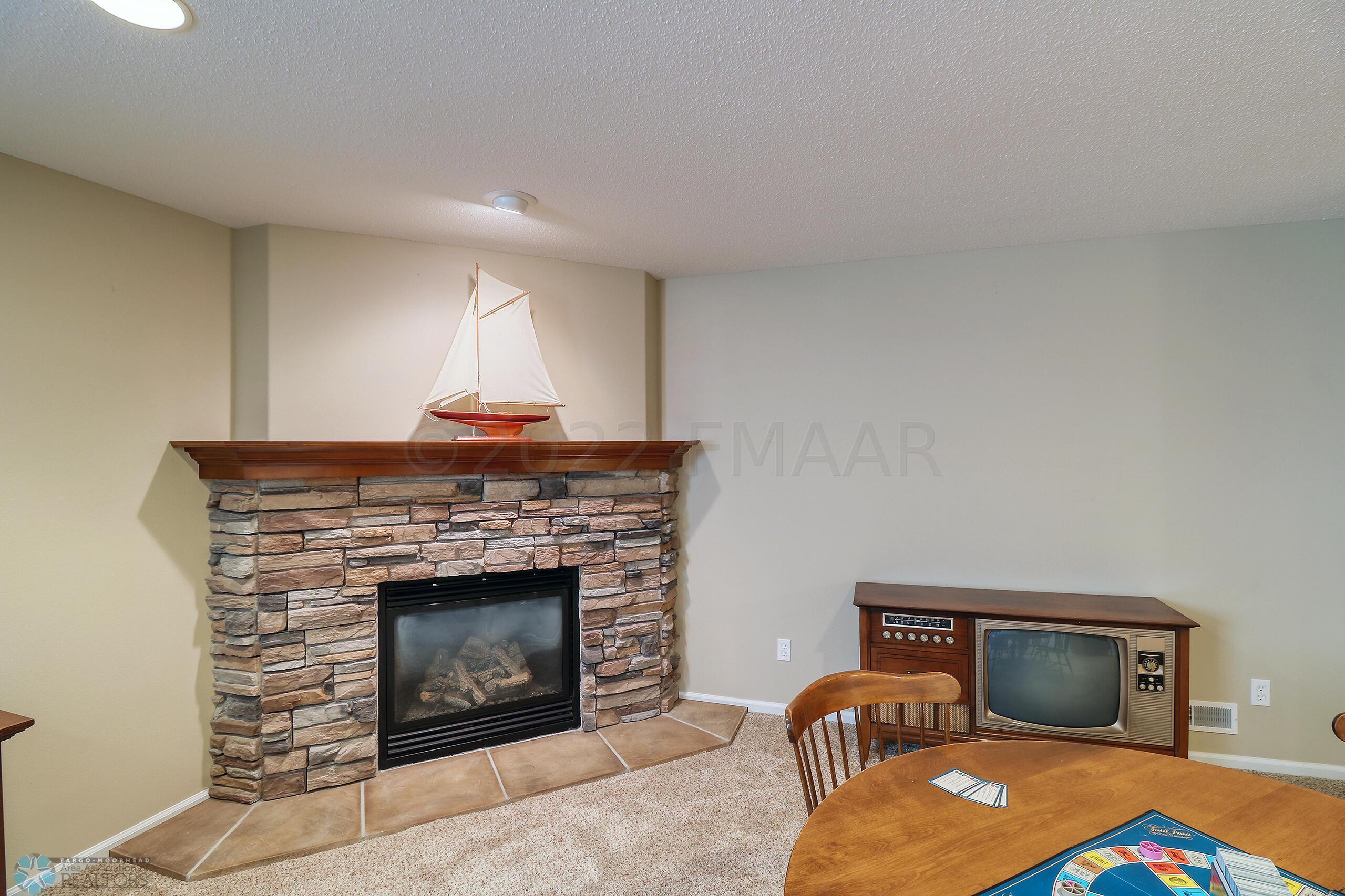 Featuring Stone Gas Fireplace