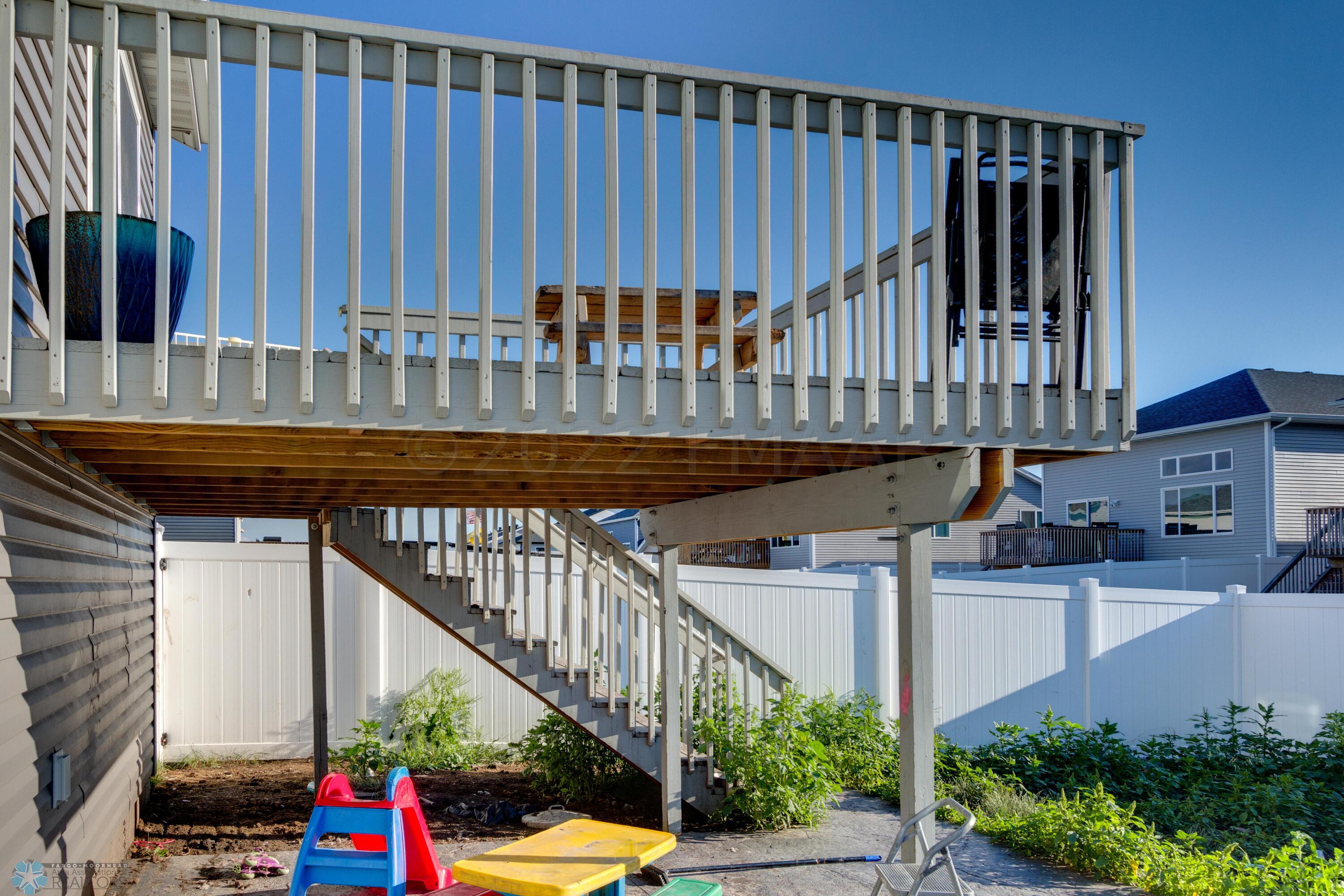 Large Deck and Stamped Patio