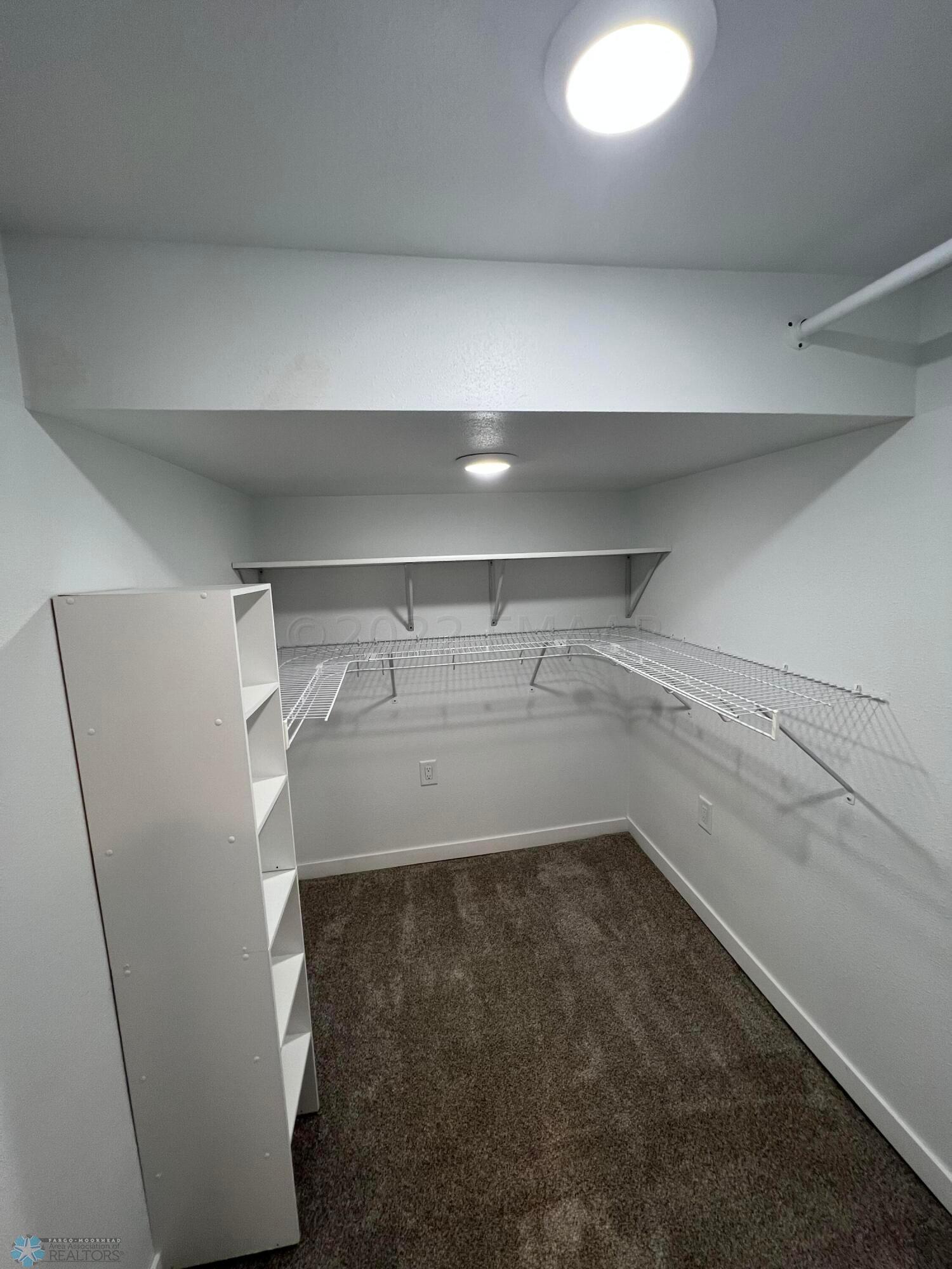 Primary Bedroom Walk in Closet