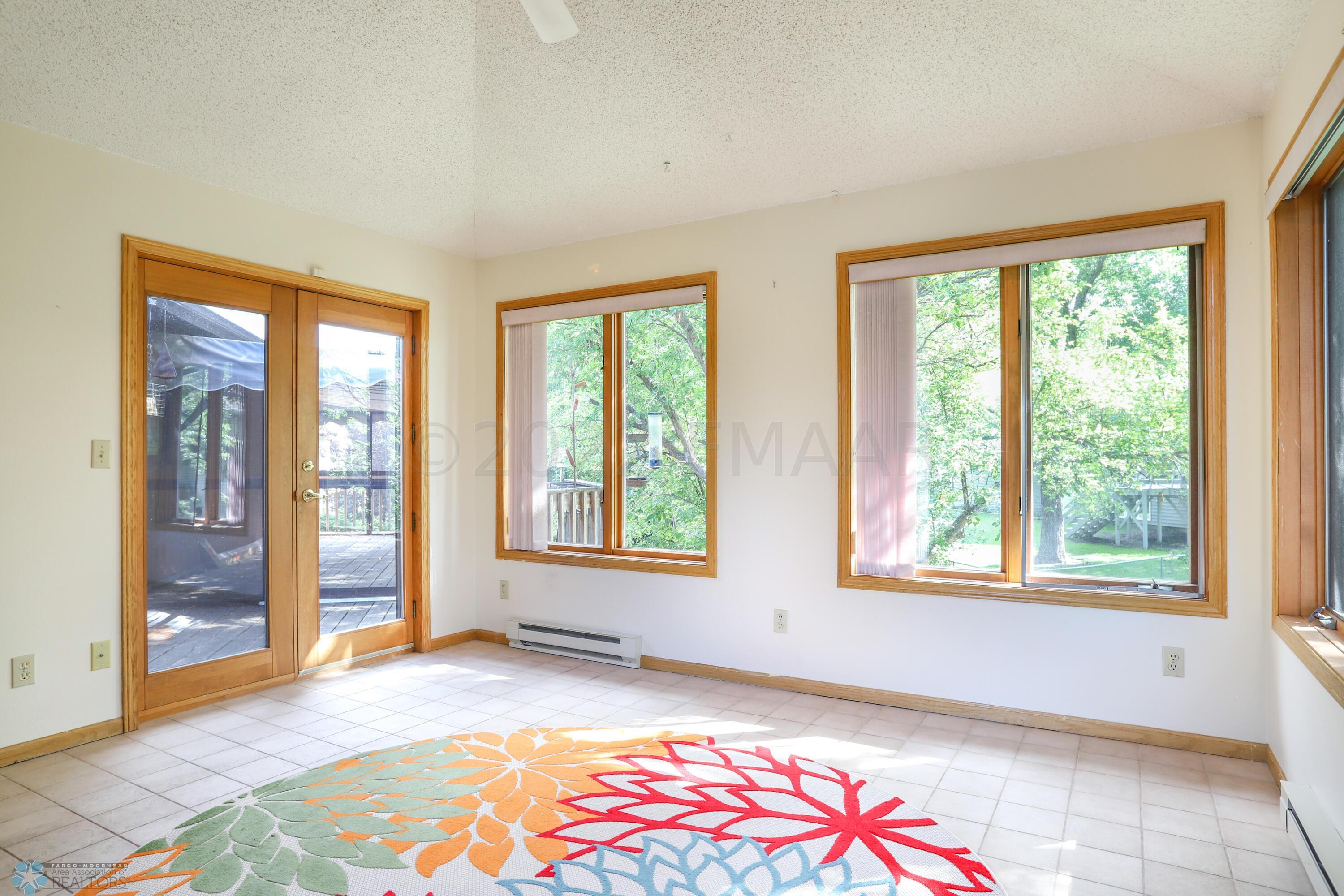 French Doors from sunroom to deck