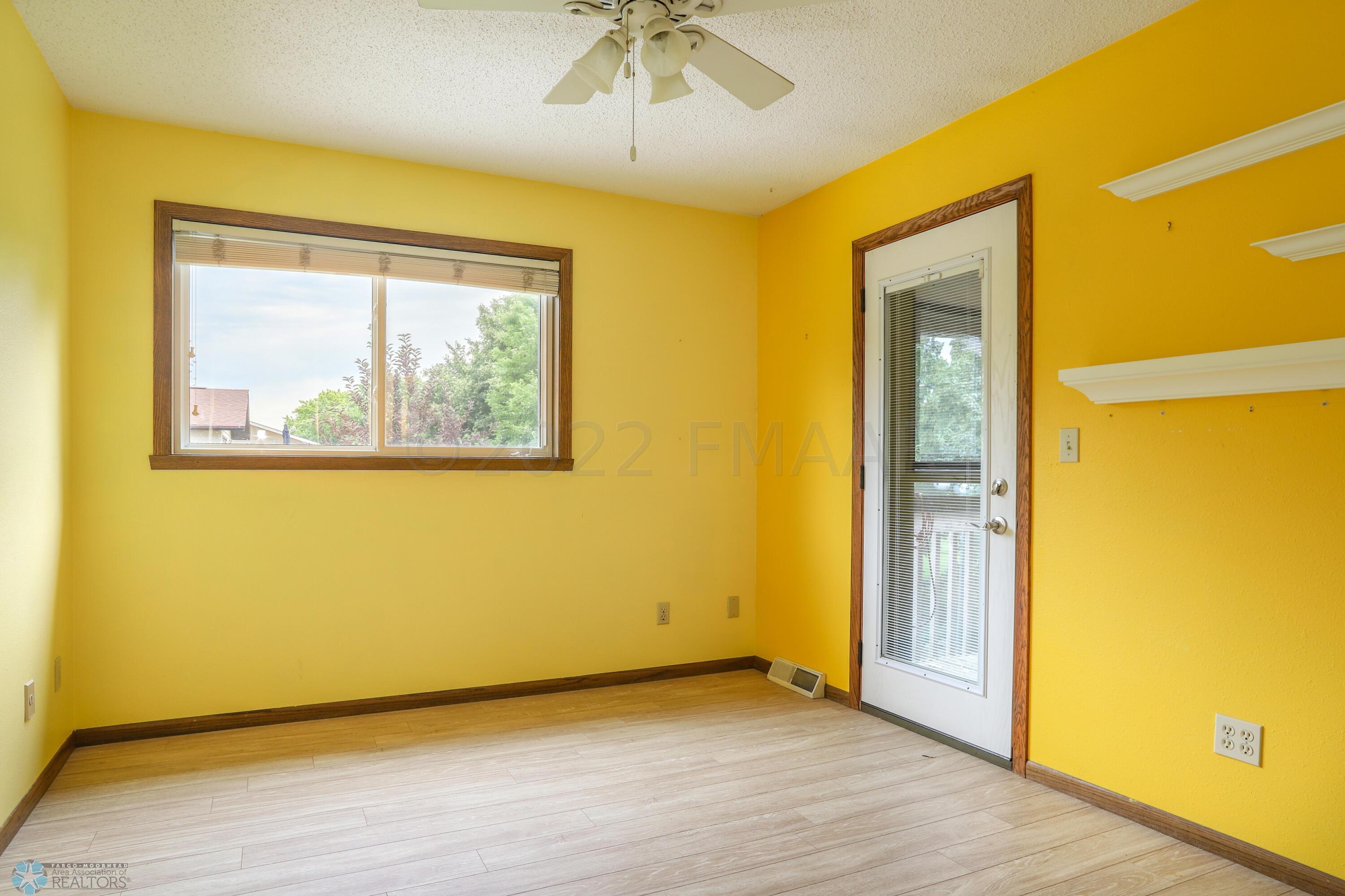 Bedroom 2 with access to screen porch