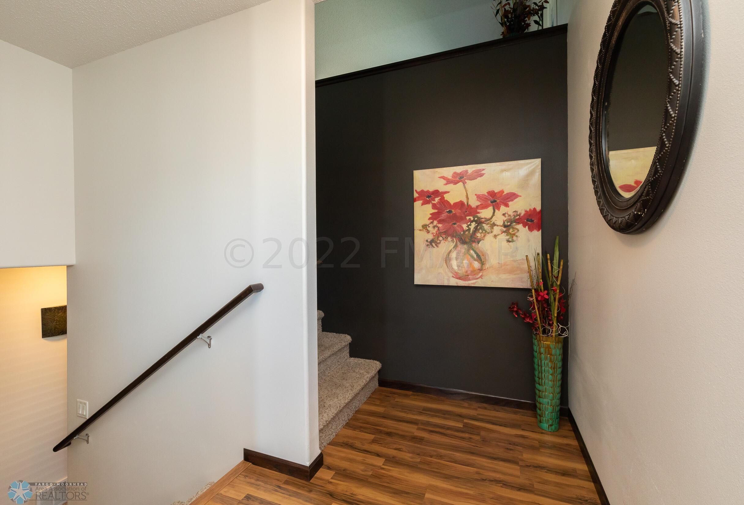 Stairs to Upper & Lower Levels