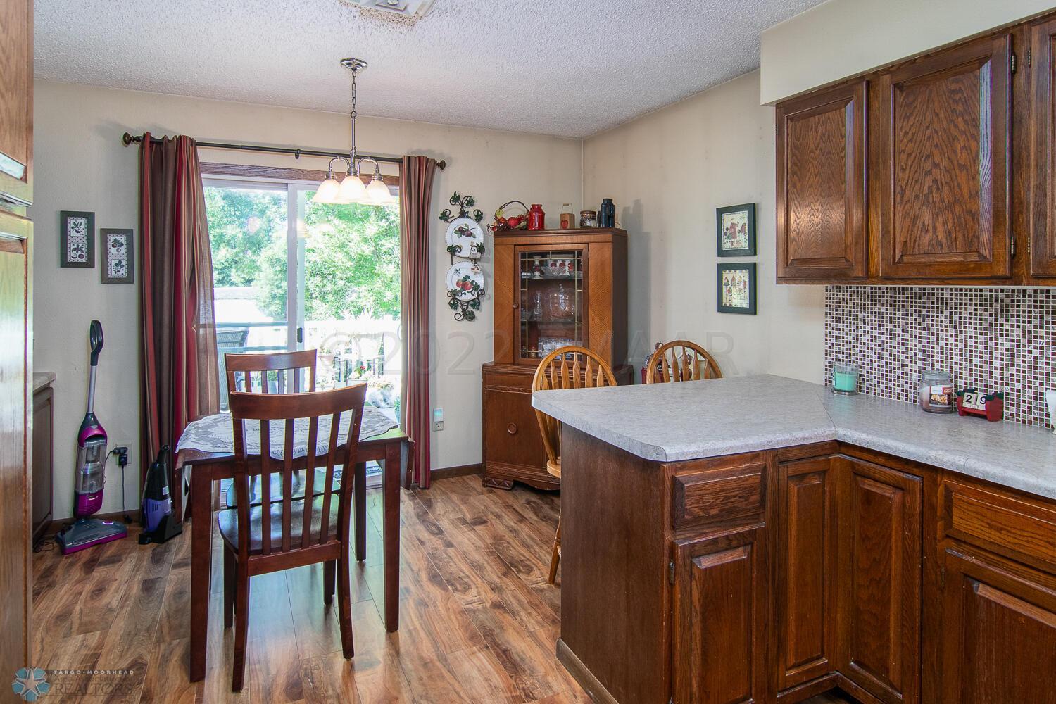 Eating area by sliding door to deck