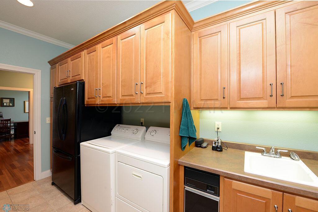 Main Floor Laundry Tons of Cabinets