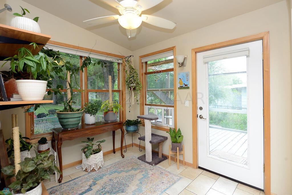 Sunroom with Patio Door to Deck