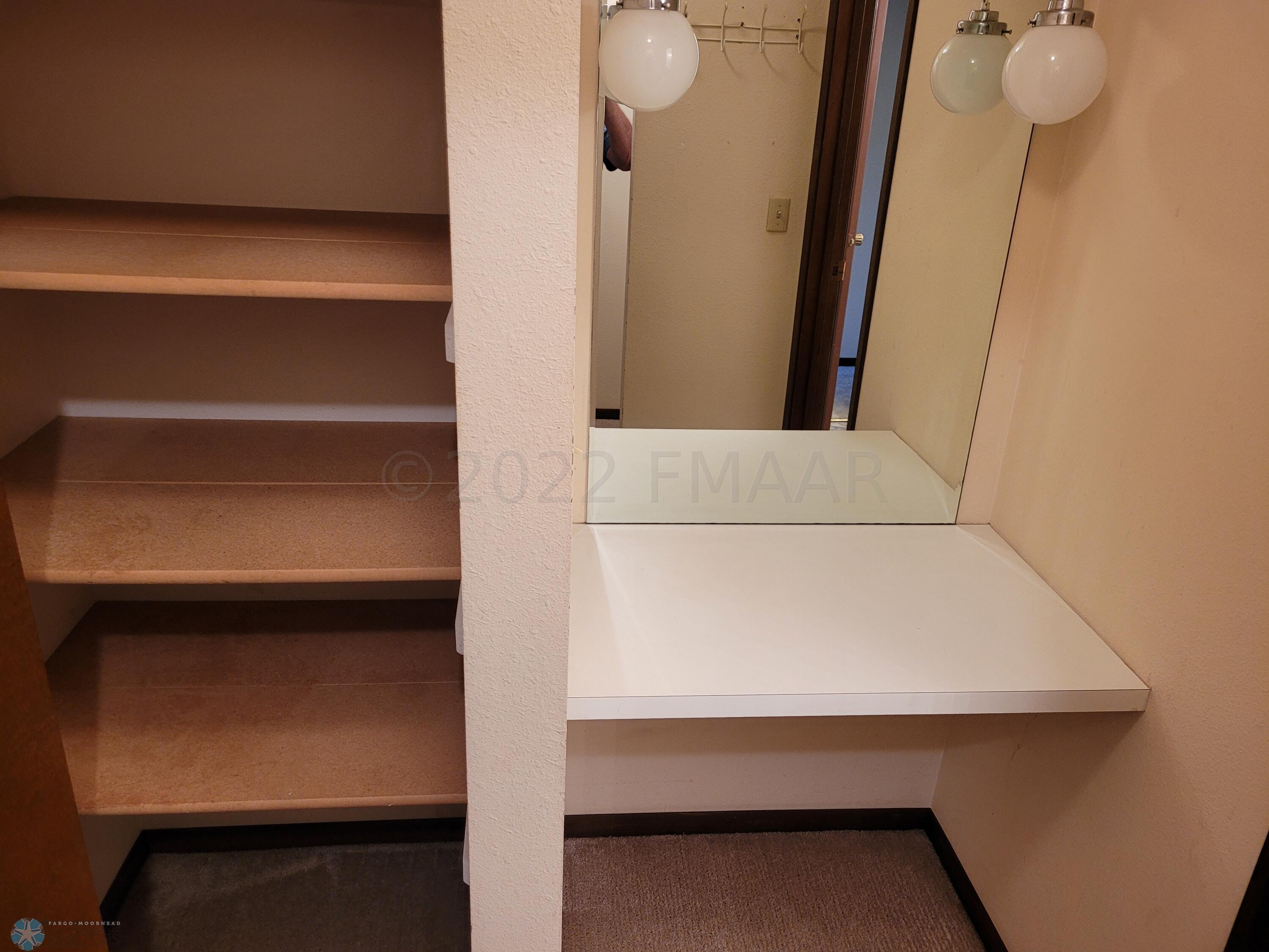 SHELVING AND MAKEUP AREA