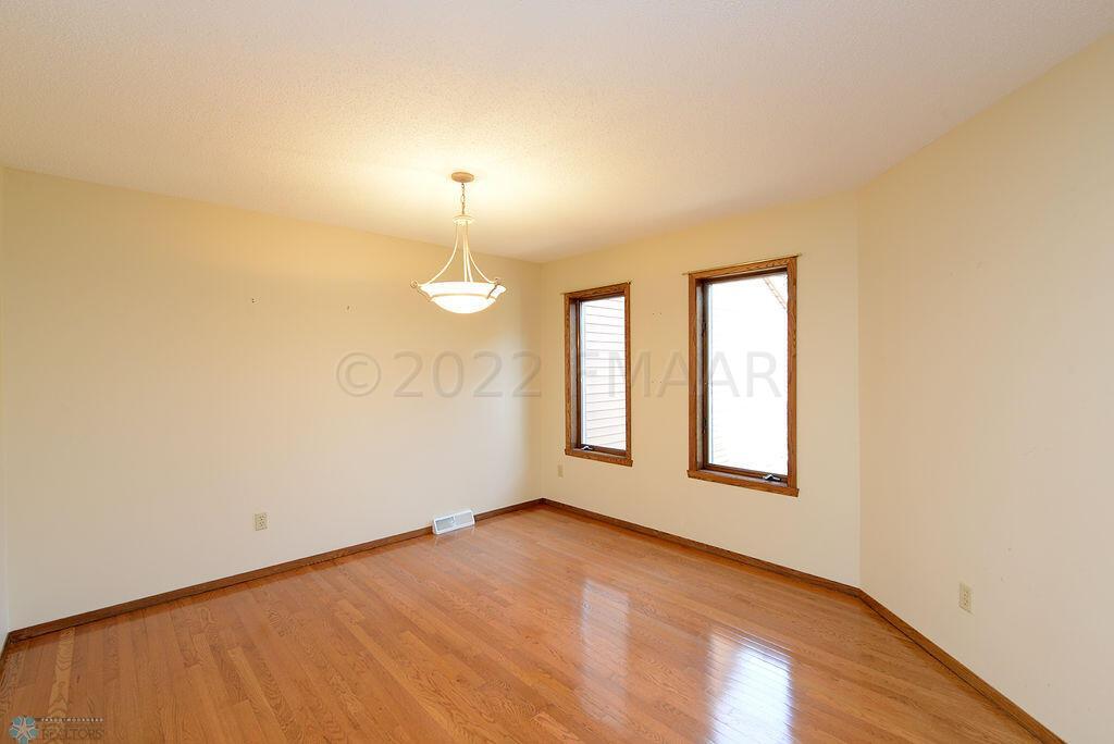 Dining Room With Hardwood Floor