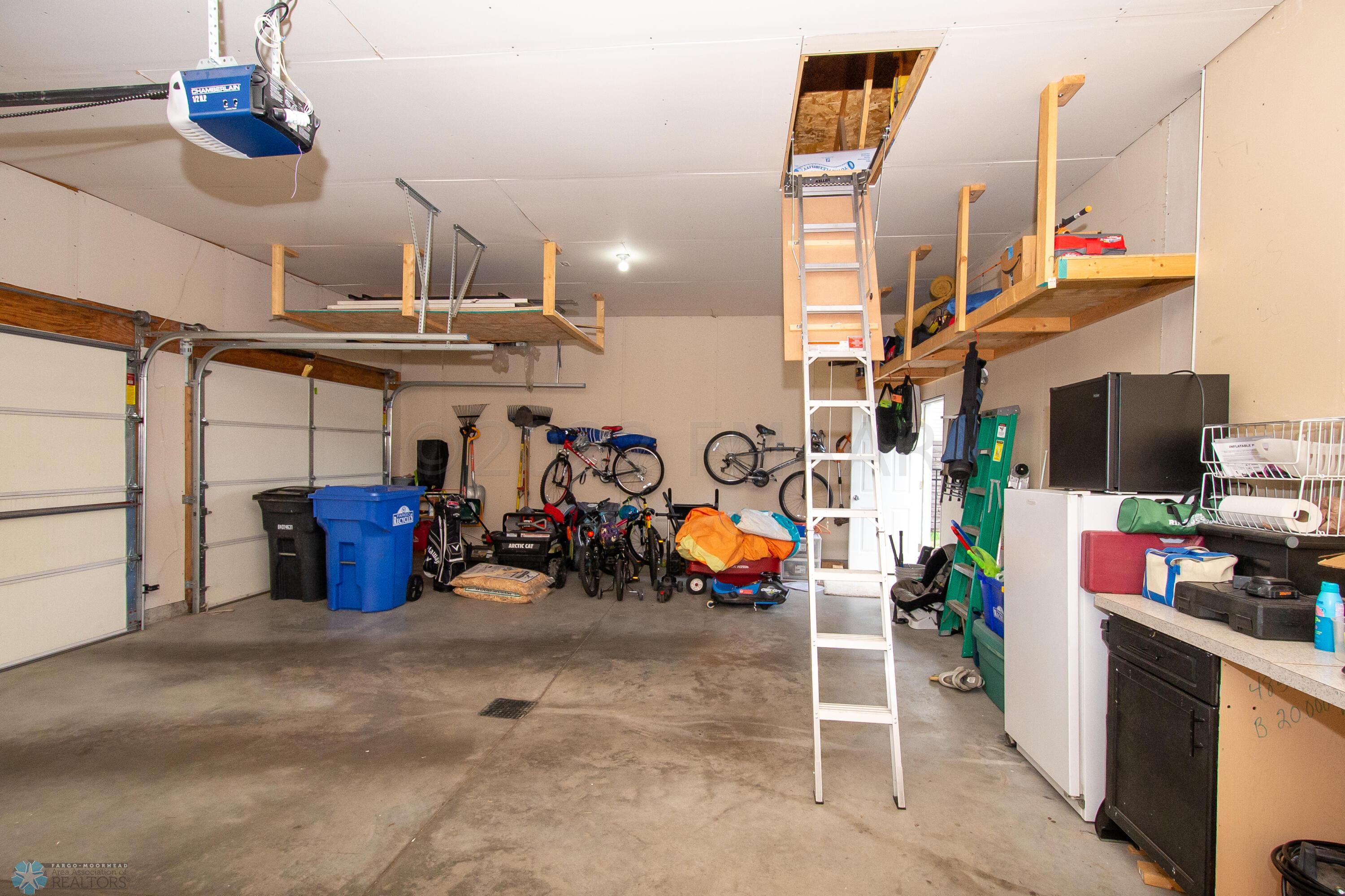 Garage with pull down access to storage