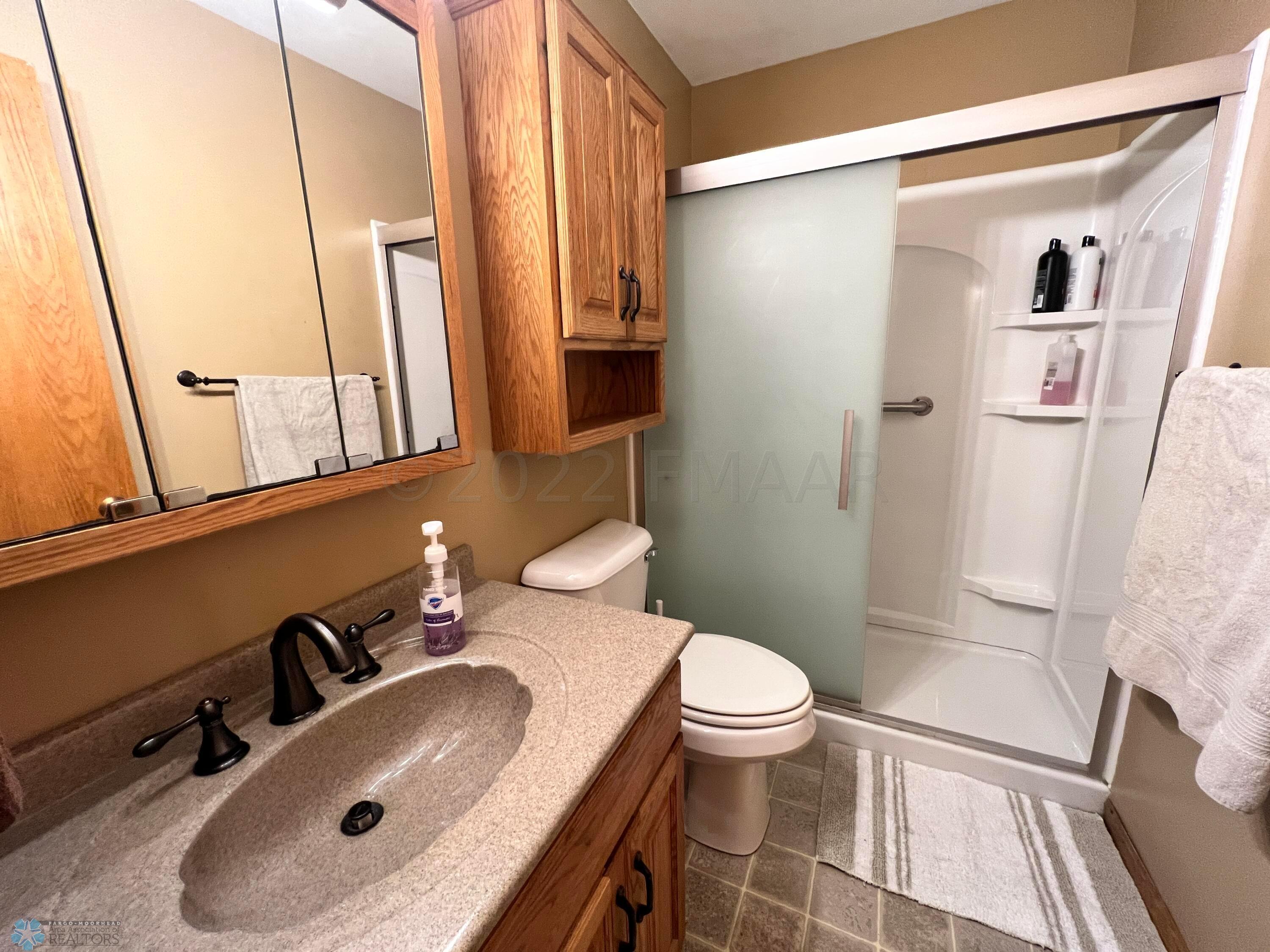 Updated bath with walk in shower