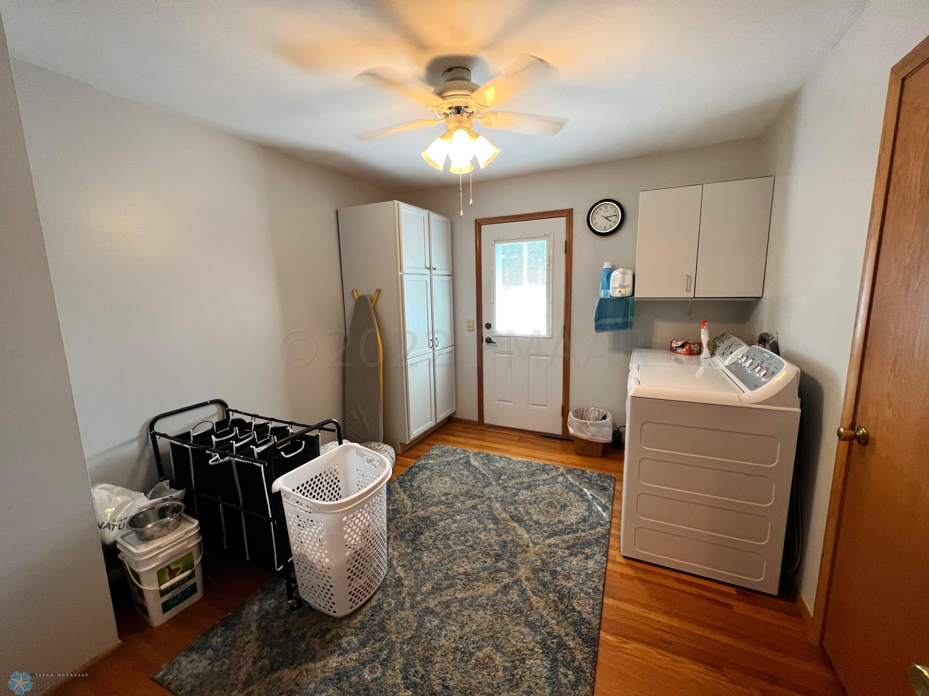 Laundry with access to back yard