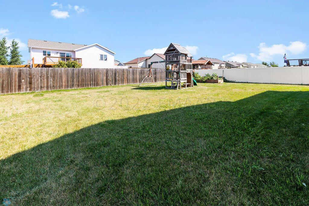 Partial fenced backyard