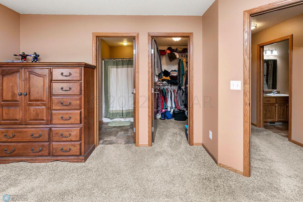 Private bath and walk-in-closet in maste
