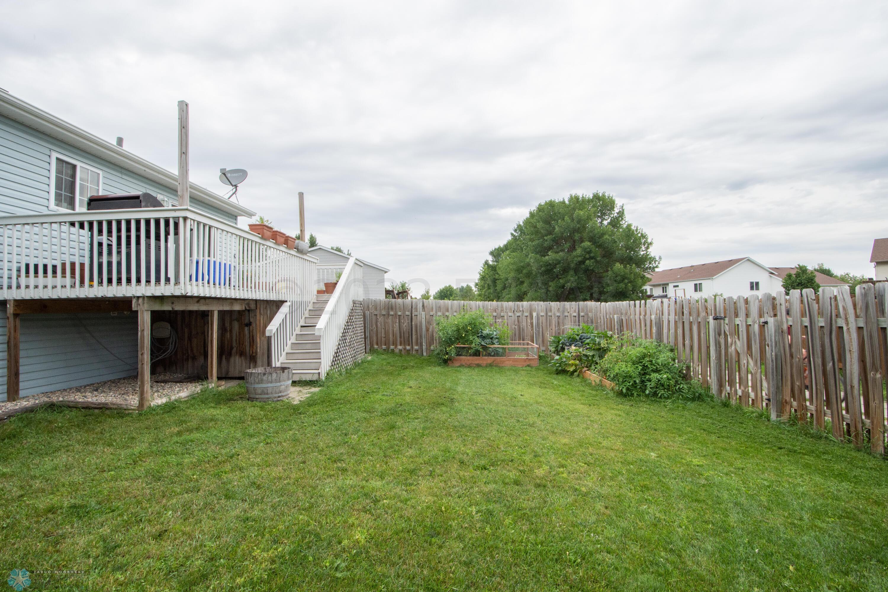 fFuly fenced. backyard
