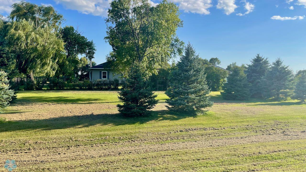 (11) View of Home from Road